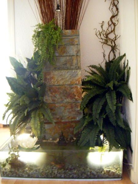 fontaine avec plantes artificielles