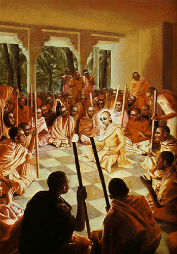 Sri Chaitanya Mahaprabhu, discutant au milieu d'un groupe de mayavadis, adeptes de Sankaracarya, qu'Il convertira au vaisnavisme, la conscience de Krishna (Chaitanya Caritamrta adi ch.7). 