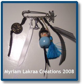 Fimo : broche-grigri, mars 2008 - Myriam Lakraa Créations
