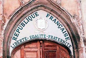 300px-Liberte-egalite-fraternite-tympanum-church-saint-panc.jpg