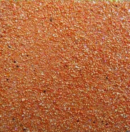 Sable coloré de couleur orange sur papier adhésif