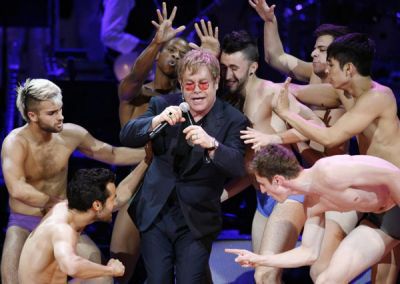Elton John performs Madonna's ''Like A Virgin'' at Rainforest concert