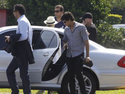 Madonna and Jesus embark in a helicopter for Angra dos Reis in Brazil on Nov. 14, 2009