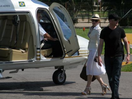 Madonna and Jesus embark in a helicopter for Angra dos Reis in Brazil on Nov. 14, 2009