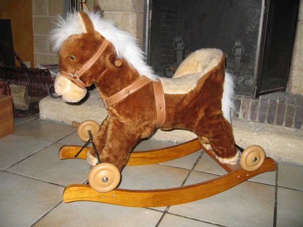 cheval a bascule avec roulettes