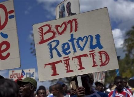 4072713249-supporters-of-haiti-s-ousted-president-jean-bert.jpg