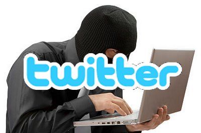 Photo de hacker avec cagoule surmonté du logo Twitter