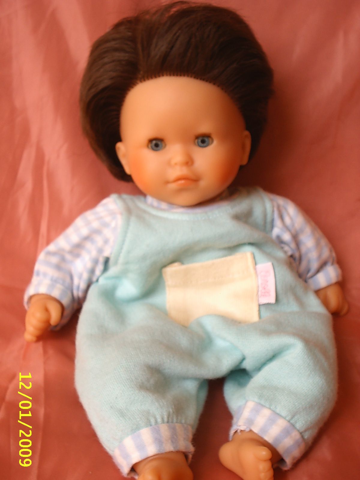 poupee theo