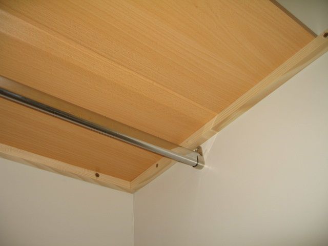 fixation tringle penderie