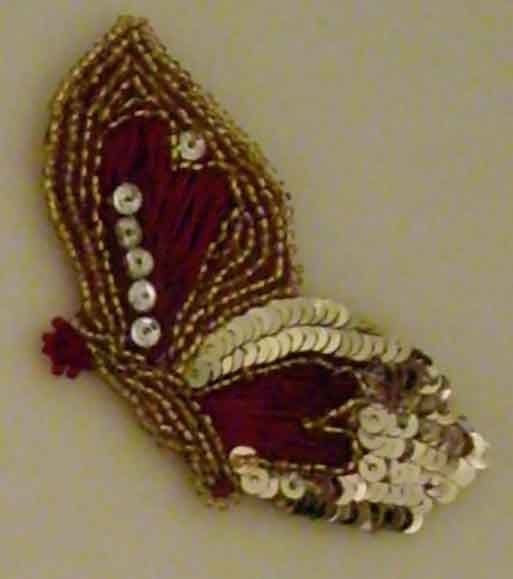 papillon rouge et or