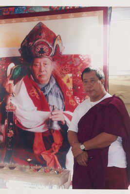 mini-Tulku-Ugen-with-Rinpoche-Thanka-photo-copy-2.jpg