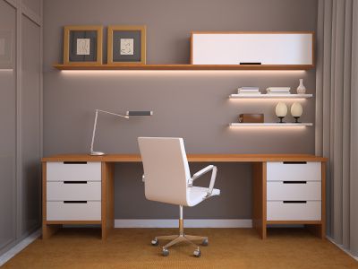 espace bureau avec fauteuil, étagères et luminaire