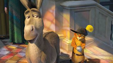 Donkey (voiced by Eddie Murphy ) and Puss-in-Boots (voiced by Antonio Banderas ) in DreamWorks Animation's Shrek the Third