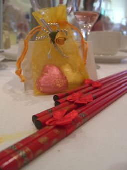 Red chopsticks and chocolate Bomboniere