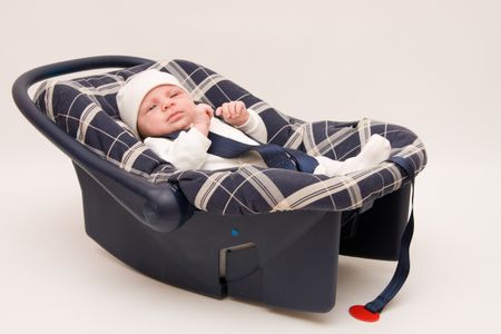 baby in safety seat