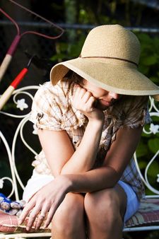 woman in floppy hat