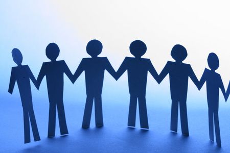 paper team linked together partnership concept
