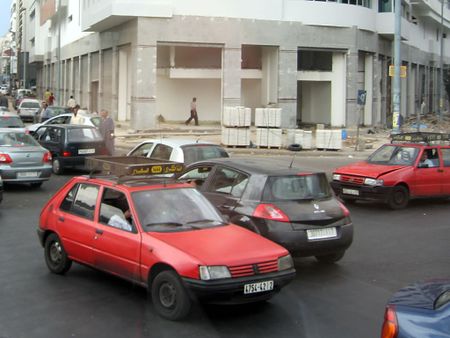 1 Petit taxis among traffic in Casablanca, Morocco. | Source | Author