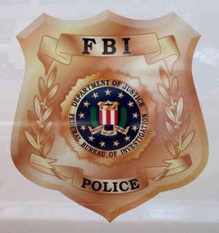 1 Shield of the FBI Police, as seen on the side of an FBI Police vehic