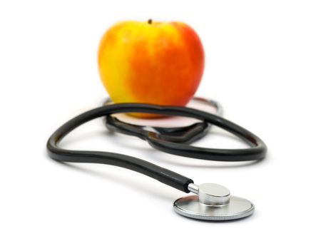 Medical stethoscope and apple