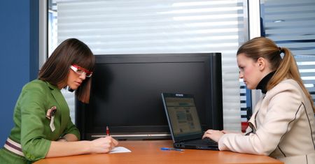 business meeting with big tft screen in background