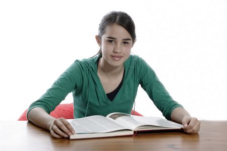 A young woman reading in the library
