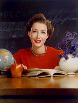 Timken Roller Bearing Co., calendar, September 1950, teacher at desk