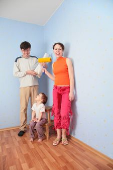 Parents with daughter in room after repair