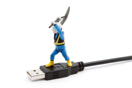 computer repair concept - usb cable repaired by workers isolated