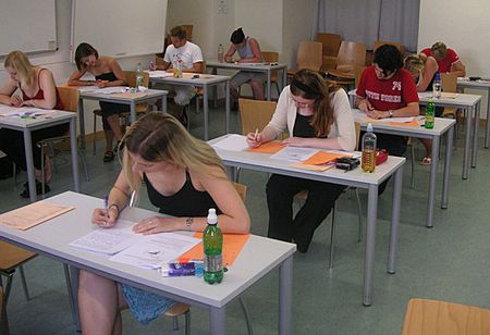 Students taking a test at the University of Vienna at the end of the s