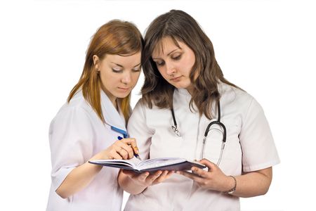nurse and a doctor discuss a case