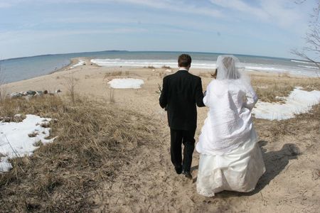 winter wedding bride groom on beach