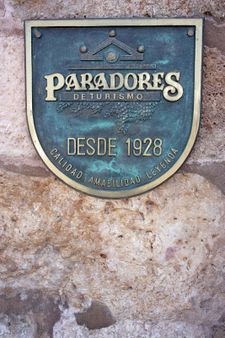 1 Logotype of Paradores in Parador de Lerma main entrance (Province of