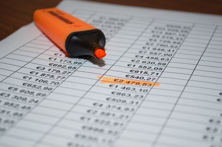 orange marker on the office table