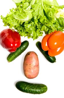 Face made out of different vegetables, isolated on white