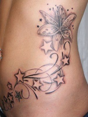 20080814222437_flowerstarstribal_more_tattoo_by_2face_tatto.jpg