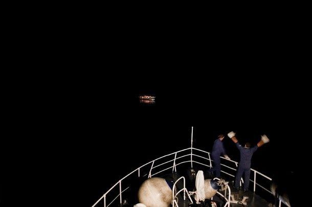 Mashid Mohadjerin, Belgium, Reporters/Redux Pictures. Coastguards spot a boat with refugees, off Lampedusa, Italy, 30 July Mashid Mohadjerin, Belgium, Reporters/Redux Pictures. Coastguards spot a boat with refugees, off Lampedusa, Italy, 30 July