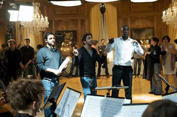 Olivier-Nakache--Eric-Toledano-et-Omar-Sy---Intouchables.gif