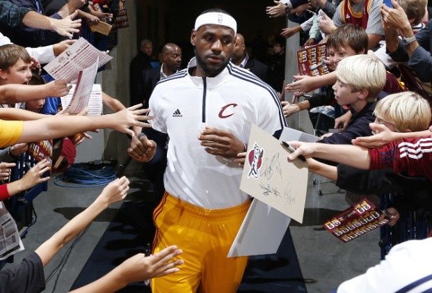 141030122156-lebron-james-enter-floor-through-fans-103014.h