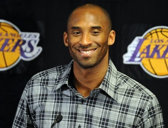 Kobe-Bryant-not-shaved-smiles-in-black-and-blue-plaid-shirt.JPG